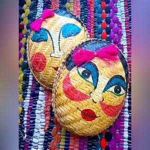 46) 2 Vintage oriental woven masks